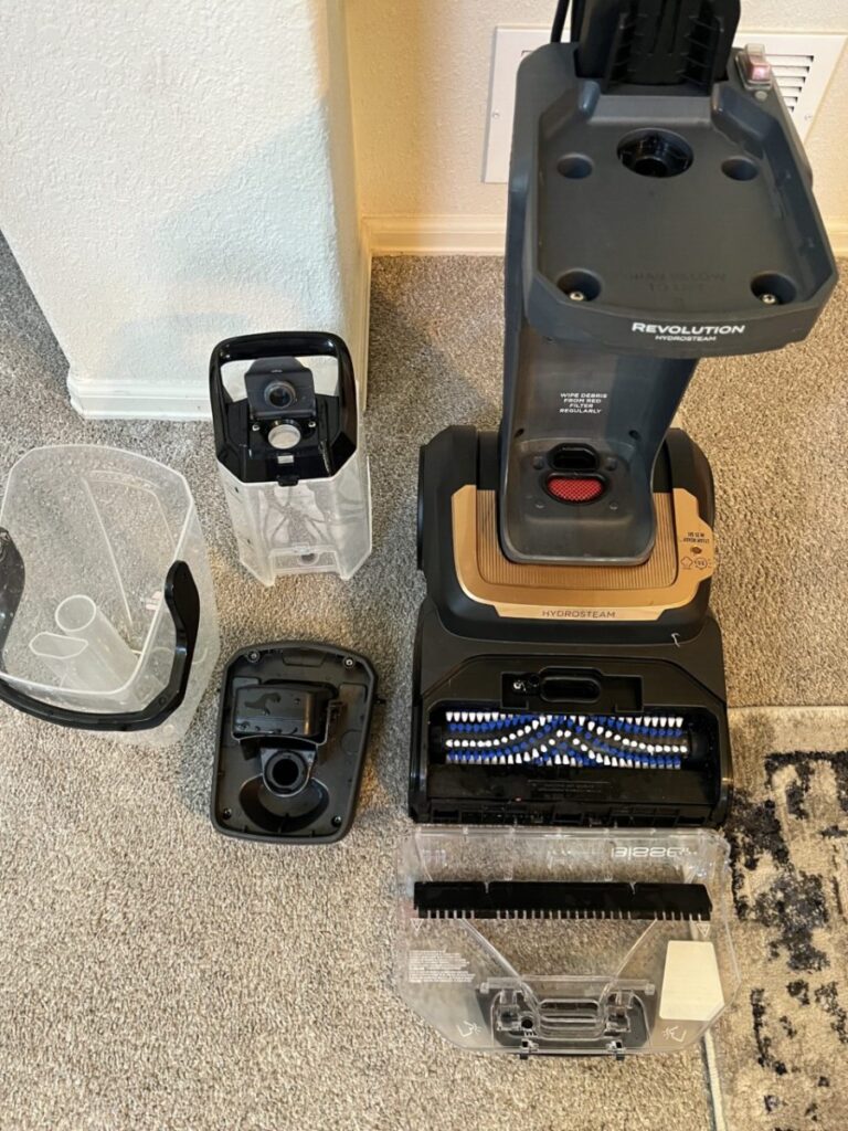 Bissell HydroSteam dirty water tank disassembled for cleaning