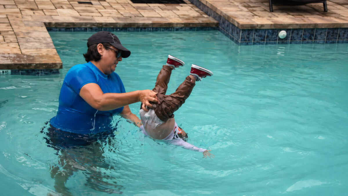 ISR swim lessons infant survival floating practice