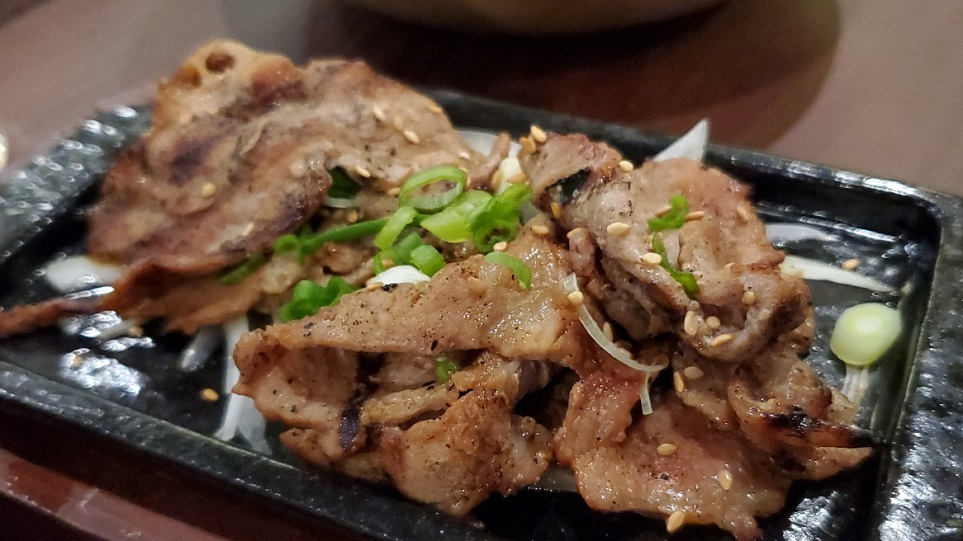 Grilled pork neck served with cold noodles at Sambong Naengmyun