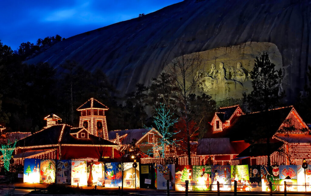 Stone Mountain Christmas lights and illuminated carving at night