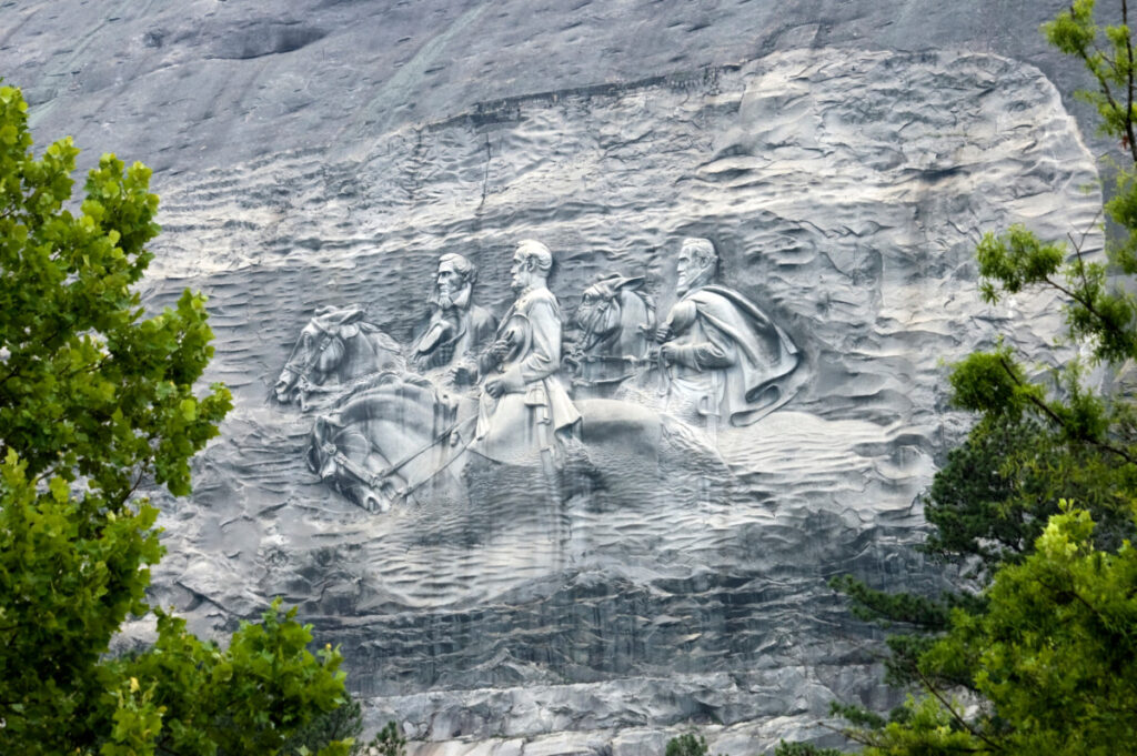 Stone Mountain carving close-up showing three Confederate figures