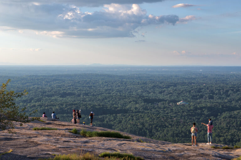 Stone Mountain day trip summit view with visitors near Atlanta